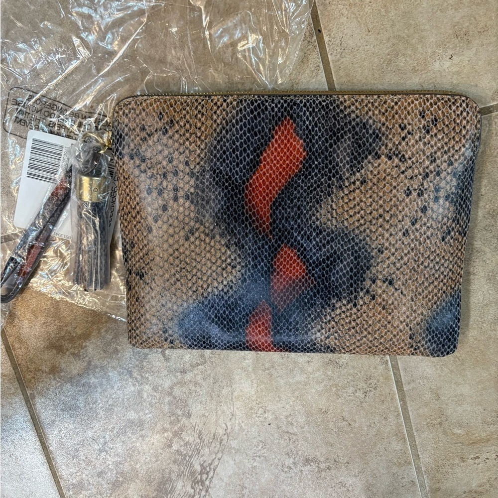 ▪️G.I.L.I. Snakeskin Clutch